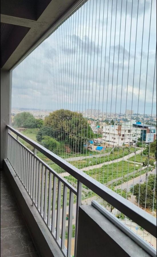 Invisible Grill for Pets Safety in Bangalore | Call 9900767340 | AV Safety Nets Invisible Grill for Pets Safety